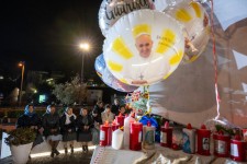 People, including nuns, gathered on Sunday to pray for Pope Francis near the entrance of the hospital in Rome where he is being treated.Credit...James Hill for The New York Times