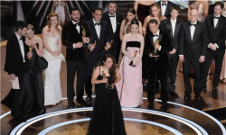 The cast and crew of Anora accept the best picture Oscar at the awards ceremony on 2 March. Photograph: Chris Pizzello/Invision/AP