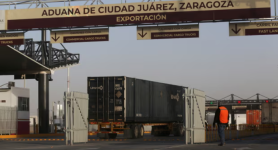 Trucks queue to cross the border between Mexico and the United States. Photograph: Carlos Sanchez/Reuters