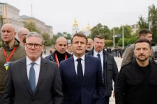 Britain's Prime Minister Keir Starmer, France's President Emmanuel Macron and Ukraine's President Volodymyr Zelensky take a walk after visiting St. Sophia Cathedral,in Kyiv on May 10, 2025. Ludovic Marin/Pool via Reuters
