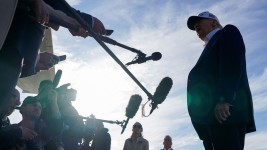 President Donald Trump speaks to the media before boarding Air Force One as he departs for Washington, DC, at Morristown Municipal Airport in Morristown, New Jersey, on May 25. Nathan Howard/Reuters