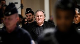 Gérard Depardieu leaves the Paris criminal court on March 24, 2025. Julien De Rosa/AFP/Getty Images