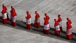 Cardinals walk through St. Peter's Square, as the body of Pope Francis was transferred to St. Peter's Basilica to lie in state. Jakub Porzycki/NurPhoto/Getty Images