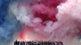 Fireworks explode as Paris Saint-Germain's players parade on a bus on the Champs-Élysées avenue in Paris on June 1, 2025. © Thibaud Moritz, AFP
