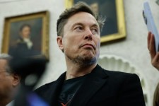 Elon Musk has long used his various enterprises to boost his AI startup. PHOTO: CHIP SOMODEVILLA/GETTY IMAGES