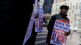 Haitian immigrants and supporters rally to reject DHS Decision to terminate TPS for Haitians, at the Manhattan borough in New York on November 21, 2017.  Eduardo Munoz/Reuters