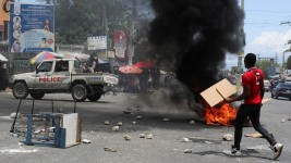 A protester demonstrating against gang-related violence is seen in Port-au-Prince, Haiti, on May 15, 2025.  Jean Feguens Regala/Reuters