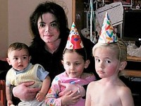 Michael Jackson with his children Bigi, Paris and Prince.