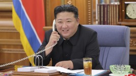 Kim Jong Un speaks with Russian President Vladimir Putin on the phone. Picture: Korean Central News Agency/Korea News Service via AP
