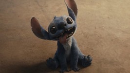 Stitch appears in a still from Disney’s live-action remake of Lilo & Stitch. As the first movie in 2025 to earn over a billion dollars, it led a slate of similar remakes and retreads. (Walt Disney Studios Motion Pictures)