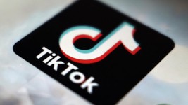 TikTok logo. AP - Kiichiro Sato