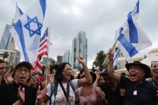 A celebration in Tel Aviv following the announcement of a deal. Photo: jack guez/AFP/Getty Images