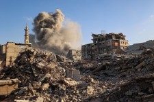 The aftermath of an Israeli strike in the Bureij camp for Palestinian refugees in the central Gaza Strip on Sunday.  Eyad Baba/AFP/Getty Images