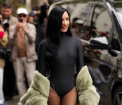 The pop star has been stepping out at various Paris Fashion Week events in head turning outfits. Picture: Edward Berthelot/Getty Images