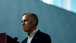 Prime Minister Mark Carney listens to a question as he participates in an announcement at a community centre in Ottawa on Oct. 10. (Justin Tang/The Canadian Press)