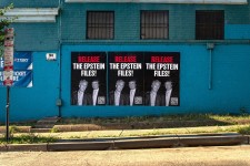 Three posters showing President Donald Trump and Jeffrey Epstein together are seen pasted on the outside of building in Washington, DC on September 8. Emily Alff/Sipa USA/AP/File