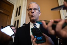 Lead Art: Senate Majority Leader John Thune (R-S.D.) speaks with reporters as he arrives for a Senate Republican Conference meeting at the . Capitol on the 38th day of a government shutdown Nov. 7, 2025. | Francis Chung/POLITICO