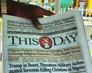 A vendor sells newspapers with headlines referring to President Donald Trump's comments about Nigeria, on the street of Lagos on Nov. 2, 2025. | Sunday Alamba/AP