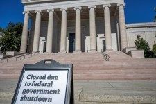 A sign indicates that the National Gallery of Art in Washington, D.C., is closed, Oct. 21, 2025, due to the government shutdown. Daniel Heuer/AFP via Getty Images
