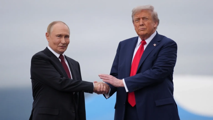 AFP via Getty Images / Vladimir Putin (left) and Donald Trump (right) last met in August for a summit as a US base in Alaska
