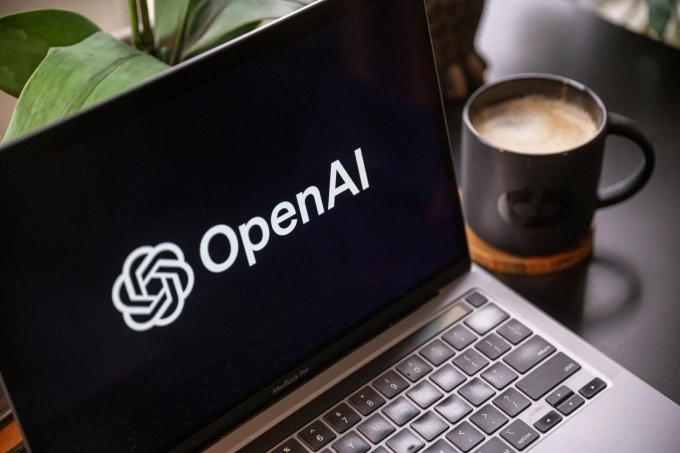 The Open AI logo on a laptop in Crockett, California.Photographer: David Paul Morris/Bloomberg