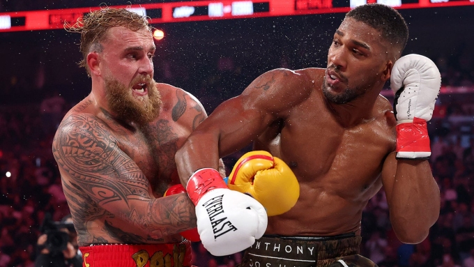 Jake Paul fights Anthony Joshua in their heavyweight bout during Jake Paul v Anthony Joshua at Kaseya Center on December 19, 2025 in Miami, Florida.  (Ed Mulholland/Getty Images for Netflix)
