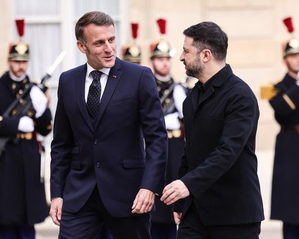 Emmanuel Macron welcomes Volodymyr Zelenskyy to the Élysée Palace in Paris on Monday. Photograph: Teresa Suárez/EPA