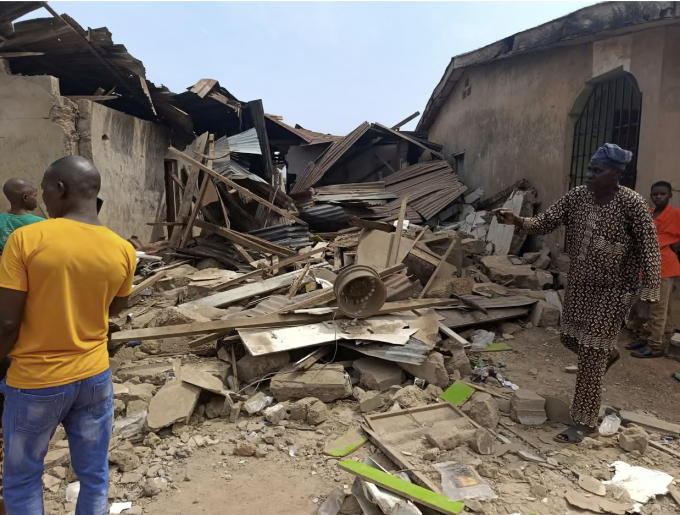 View image in fullscreen Residents inspect damage after a US strike against IS militants in Offa, Kwara state, Nigeria, on Friday. Photograph: Abdullahi Dare Akogun/Reuters