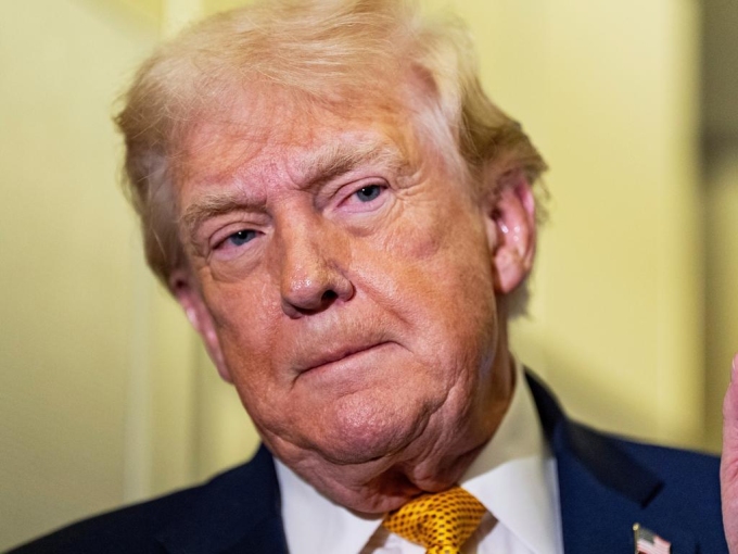 President Donald Trump speaking with reporters while in flight on Air Force One. Picture: Alex Brandon/AP President Donald Trump speaking with reporters while in flight on Air Force One. Picture: Alex Brandon/AP