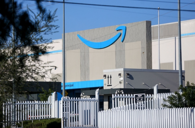 An Amazon warehouse. The company is laying of an additional 16,000 employees.  Julio Cesar Aguilar/AFP/Getty Images