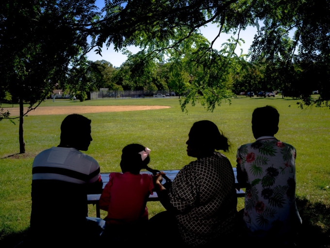 A family from Honduras at a park in northern Illinois in 2023. The Temporary Protected Status program allows people from countries facing war or other instability to temporarily live and work in the United States.Credit...Sebastian Hidalgo for The New Yor