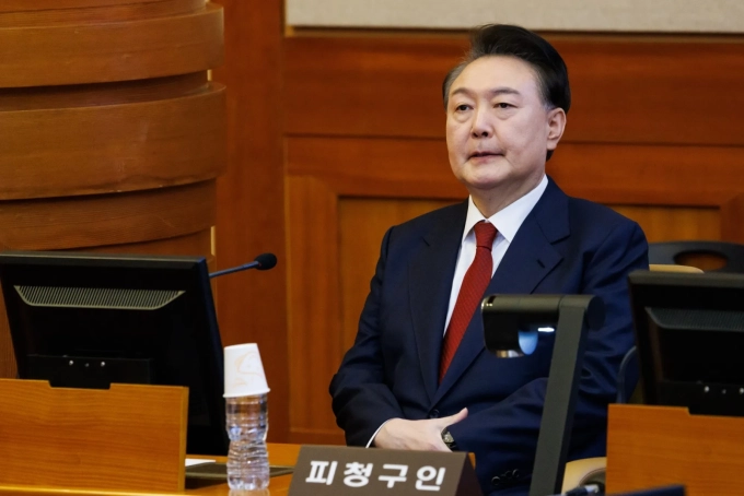 South Korean President Yoon Suk Yeol attends a hearing for his impeachment trial at the Constitutional Court in Seoul, South Korea, on Feb. 13, 2025.Source: Bloomberg