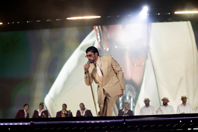 Puerto Rican singer Bad Bunny performs during the opening concert of his "DeBi TiRAR MaS FOToS World Tour" at the Felix Sanchez Olympic Stadium in Santo Domingo, Dominican Republic, on November 21, 2025.  Erika Santelices/Reuters