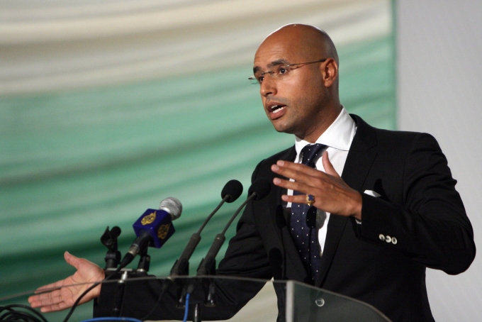 Saif al-Islam Gadhafi, son of Libyan leader Moamer Gadhafi, gestures as he speaks during a meeting with different social organizations in the capital Tripoli on July 24, 2008.  Mahmud Turkia/AFP/Getty Images