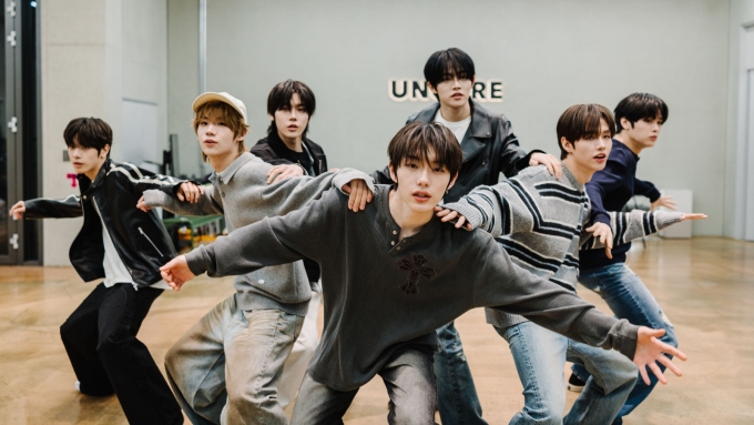 K-pop rookie group Close Your Eyes rehearse in the studio ahead of their first solo concert. From Left to right: Seung Ho Song, Kenshin Sakurada, Yeo-jun Jang, Kyungbae Seo, Min-wook Jeon, Sung Min Kim, and Jingxiang Ma.  Jun Michael Park for CNN