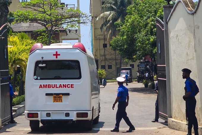 An ambulance at the naval headquarters in Galle, Sri Lanka, on Wednesday. Sri Lanka said it had rescued 32 critically injured sailors after their ship sank earlier in the day.Credit...Agence France-Presse — Getty Images