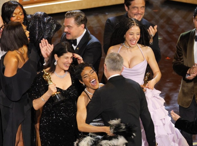The cast of ‘One Battle After Another’ celebrates their best picture win. Mike Blake/Reuters