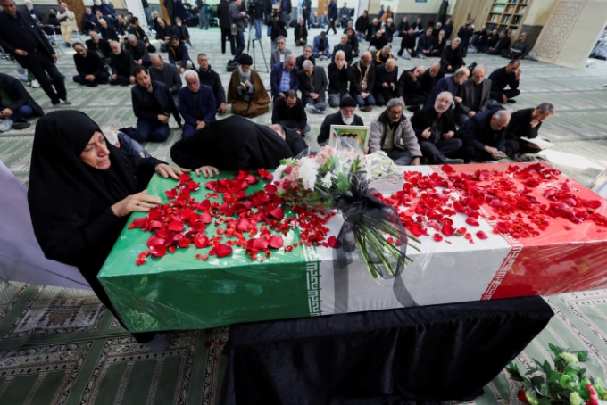 People mourned during a Saturday funeral ceremony for a political adviser to Iran’s late Supreme Leader Ayatollah Ali Khamenei who was killed by an airstrike. Alaa Al Marjani/Reuters