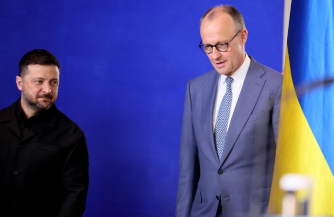 Ukrainian President Volodymyr Zelensky, in black, with German Chancellor Friedrich Merz in Berlin this month. Andreas Gora/DDP/Zuma Press