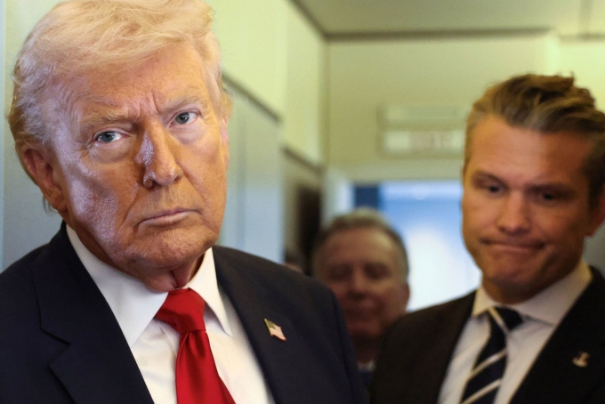President Donald Trump speaks to reporters aboard Air Force One on March 7. Kevin Lamarque/Reuters