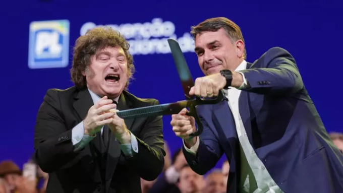 Brazilian Senator Flavio Bolsonaro, right, accompanied by Argentina's President Javier Milei shown at the Liberal Party convention confirming Bolsonaro as a presidential candidate, Sao Paulo, Saturday, July 25, 2026. © Ettore Chiereguini, AP