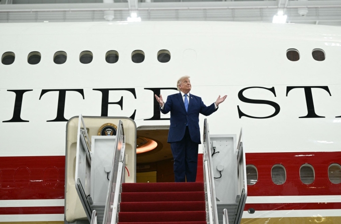 President Donald Trump steps out of the new Air Force One, gifted to him by by Qatar, in a hangar at Joint Base Andrews in Maryland on June 19. Brendan Smialowski/AFP/Getty Images