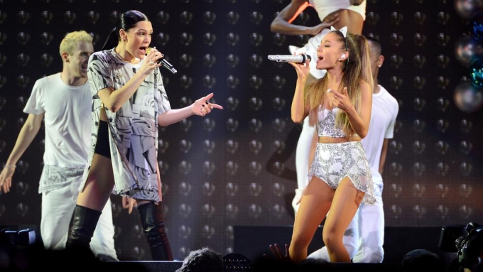 Grande (right) performs on stage with Jessie J back in 2014. Picture: Stephen Lovekin/Getty Images for iHeartMedia