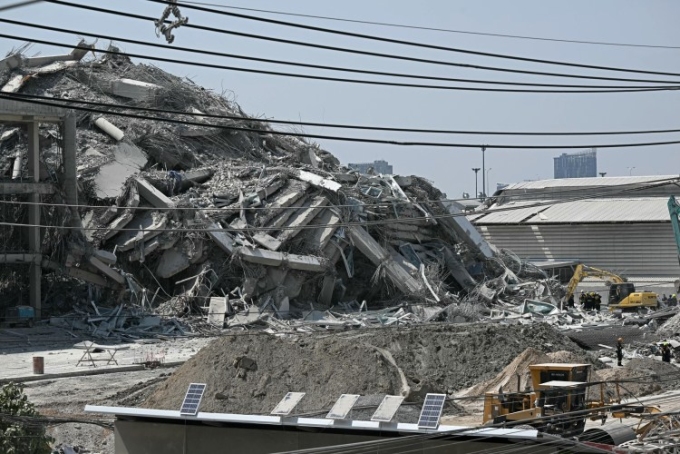 A collapsed building at a construction site is seen in Bangkok, Thailand, on March 28, 2025, after an earthquake. | LILLIAN SUWANRUMPHA/AFP via Getty Images/LILLIAN SUWANRUMPHA/AFP via Getty Images