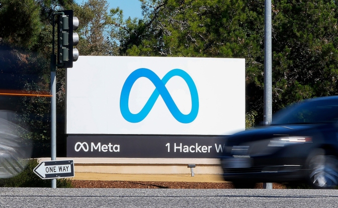A car passes a sign with a Meta logo at the company headquarters in Menlo Park, California, on October 28, 2021. Tony Avelar/AP/File