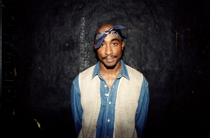Rapper Tupac Shakur poses for photos backstage after his performance at the Regal Theater in Chicago, in March 1994.  Raymond Boyd/Michael Ochs Archives/Getty Images