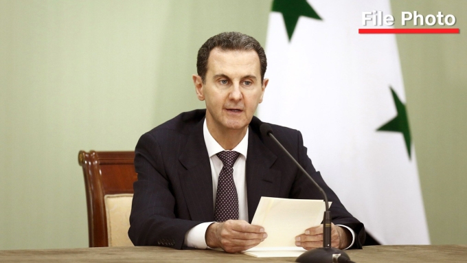 Bashar al-Assad signs a deal between Iran and Syria, on May 03, 2023 In Damascus, Syria.  Borna News/Matin Ghasemi/Aksonline ATPImages/Getty Images