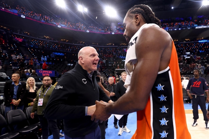 Owner Steve Ballmer of the Los Angeles Clippers congratulates Kawhi Leonard #2 after his 55-point game to win 112-99 against the Detroit Pistons at Intuit Dome. Getty Images