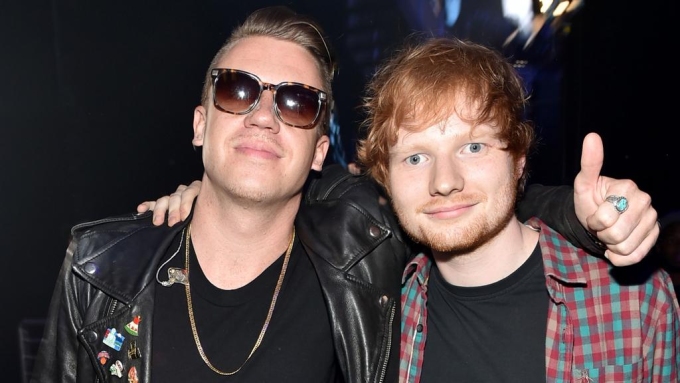 Macklemore (left) and Ed Sheeran were like “brothers” for 13 years – now it appears their friendship is over. Picture: Theo Wargo/Getty Images for iHeartMedia