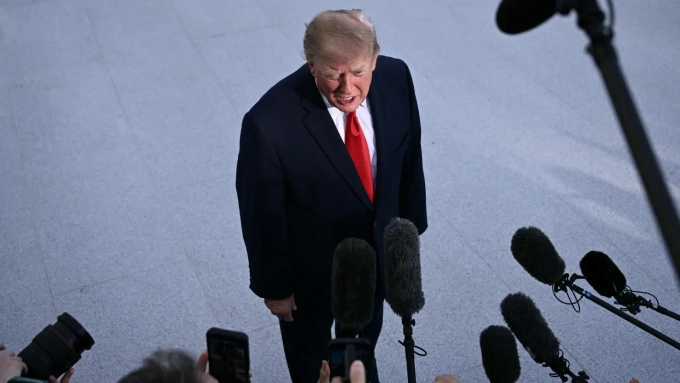 US President Donald Trump speaks to the press before boarding Marine One as he departs from the South Lawn of the White House in Washington, DC, on Oct. 12, 2026. Brendan Smialowski | AFP | Getty Images